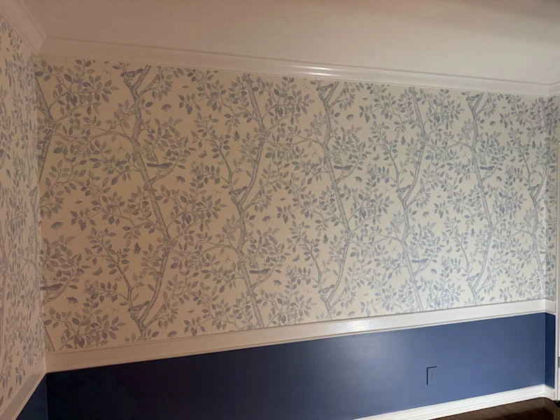 Patterned wallpaper wall in a Brooklyn Park home near Palmer Lake