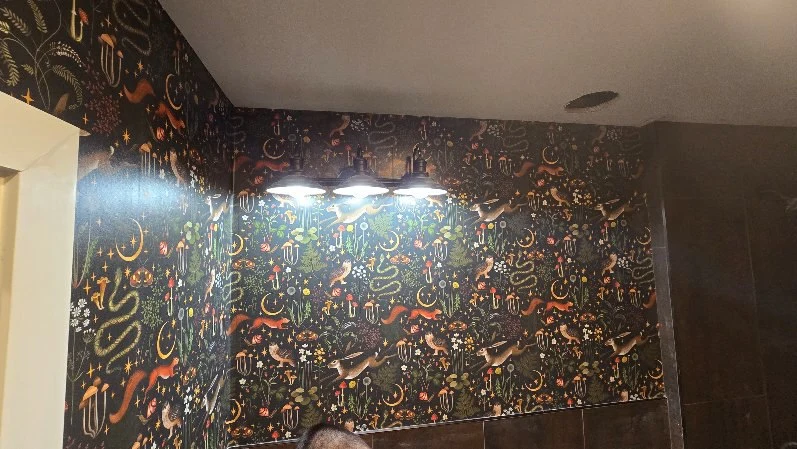 Dramatic floral wallpaper wall in an Eden Prairie residence near Bryant Lake