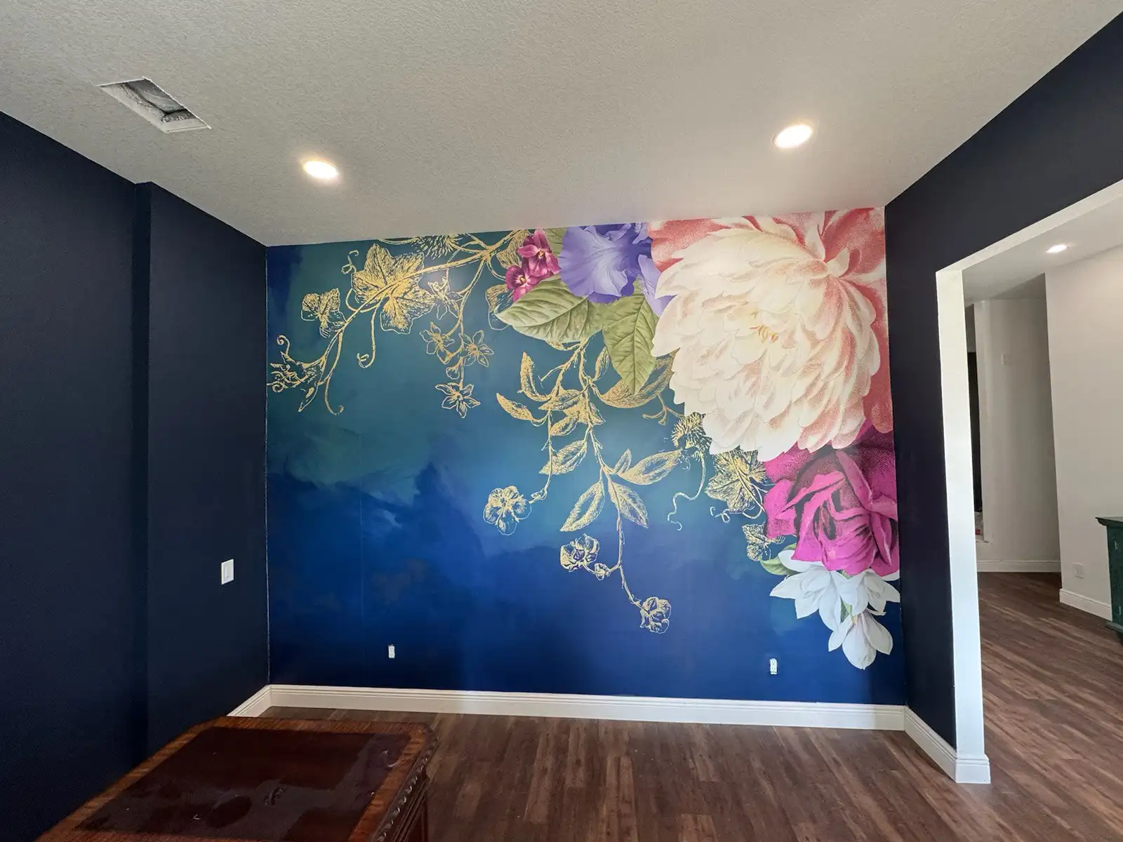 Colorful floral mural wall in an Eden Prairie room near Flying Cloud