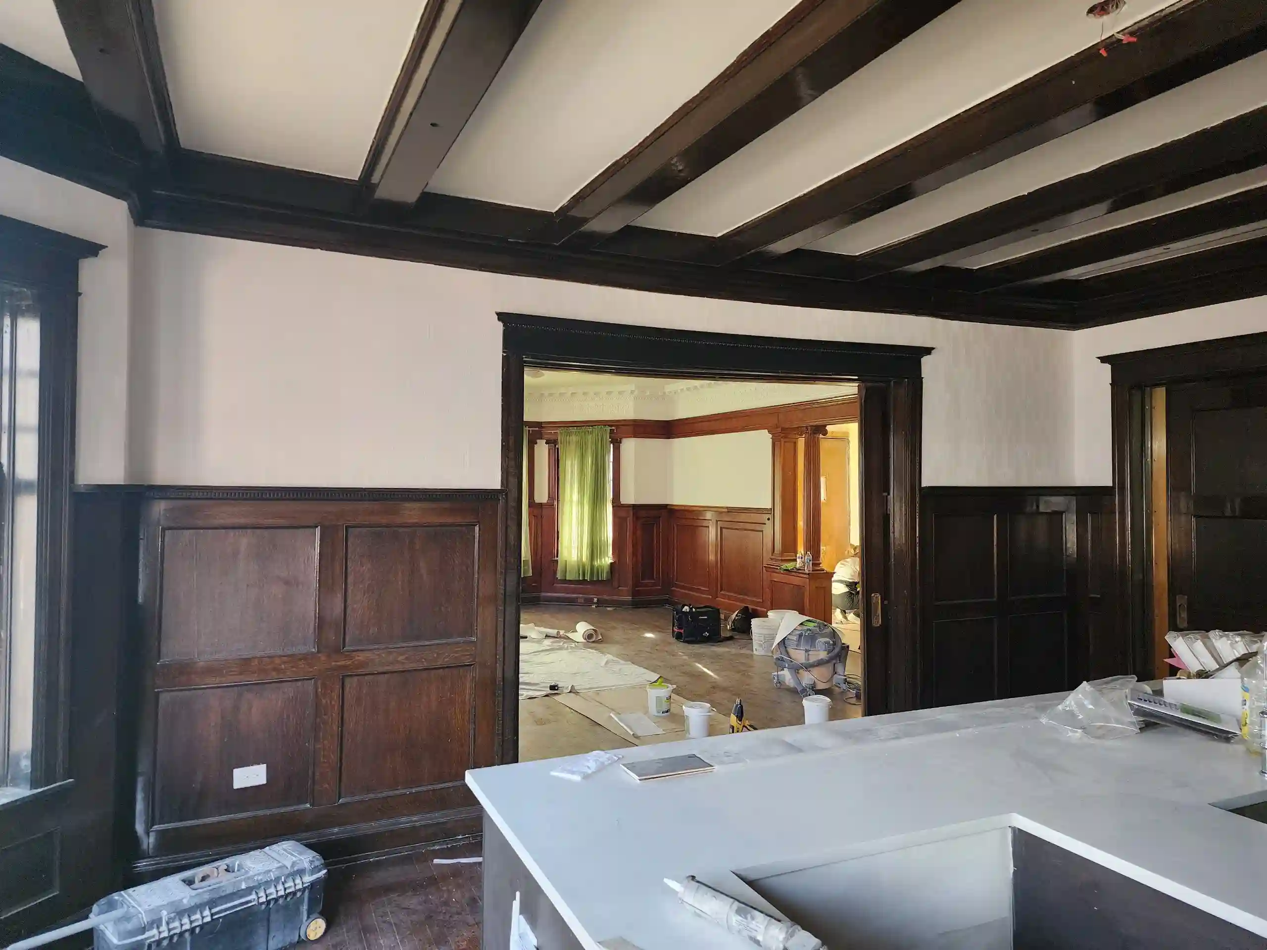 Original wood beams and patterned wallcovering in St Paul near Summit Hill
