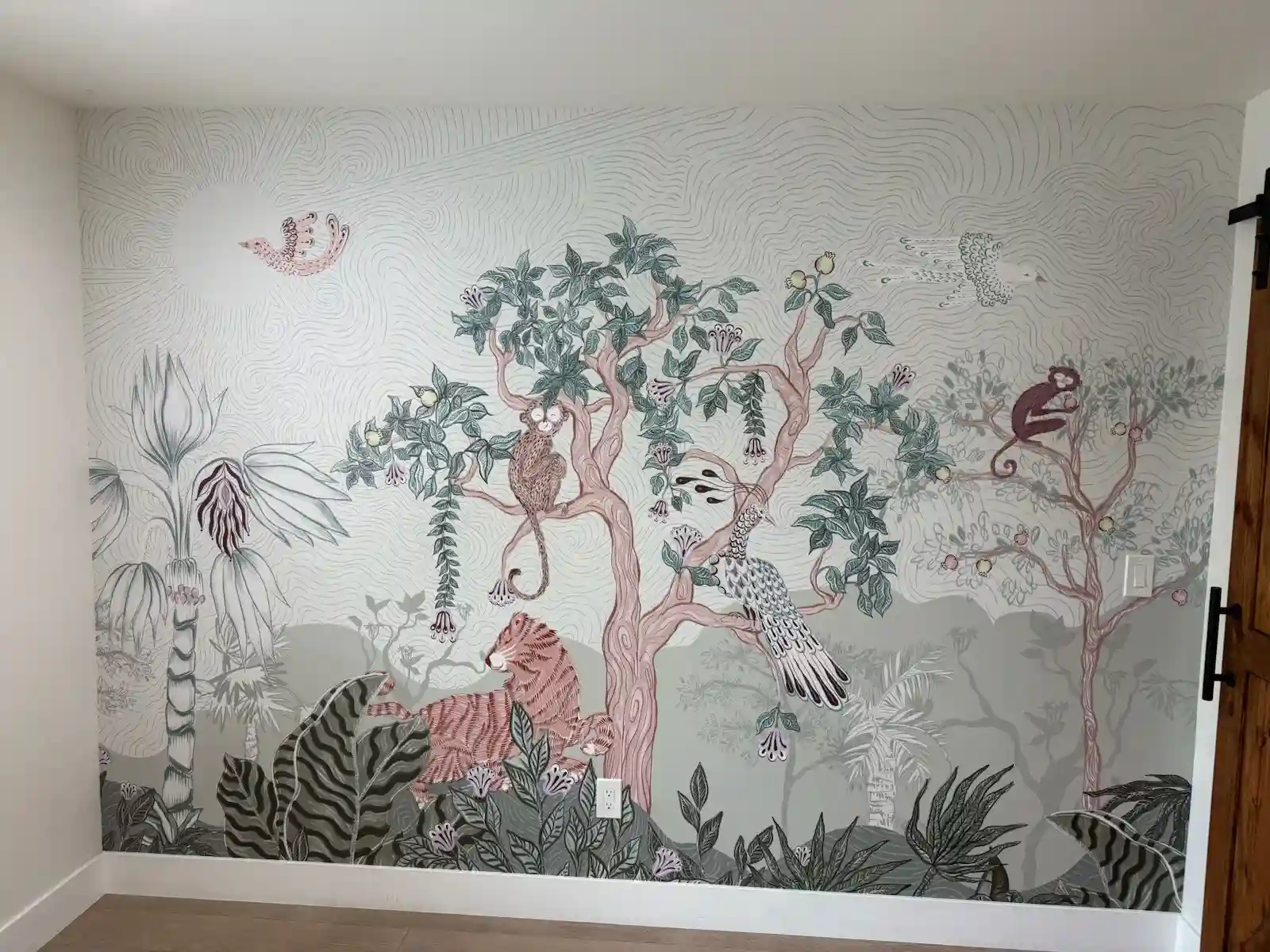 Soft floral wallpaper installation in a bedroom near St Anthony Village