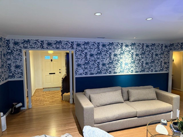 Finished blue feature wall in a Minneapolis living room near Uptown