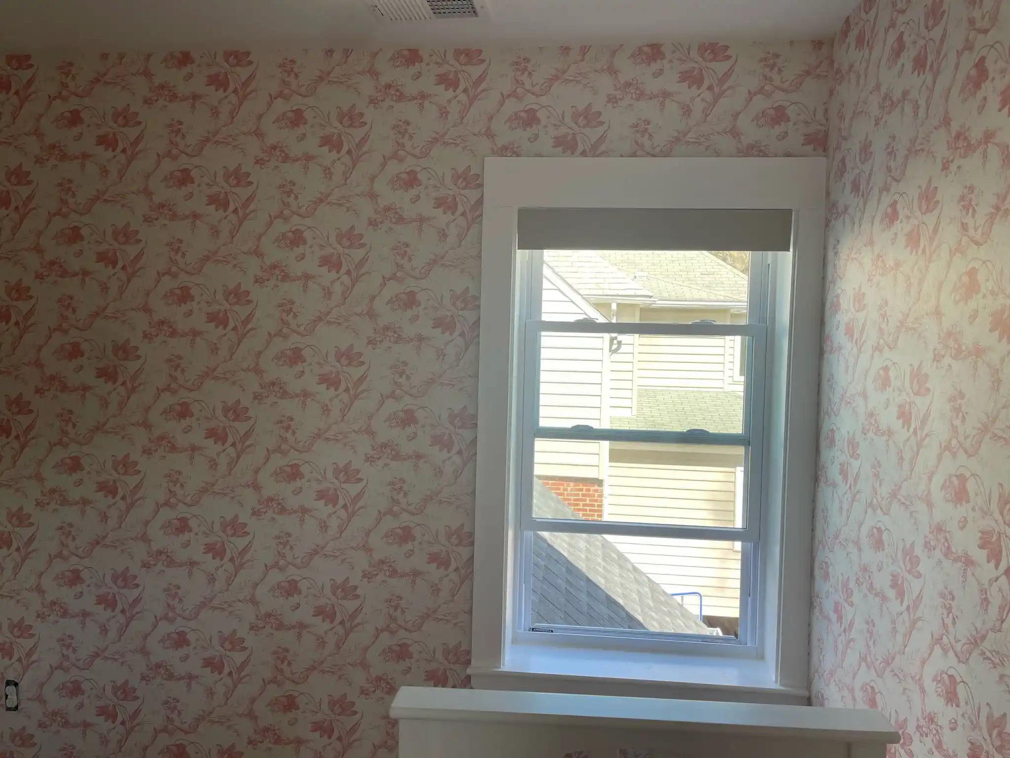 Delicate floral wallpaper in a Minneapolis home near Longfellow