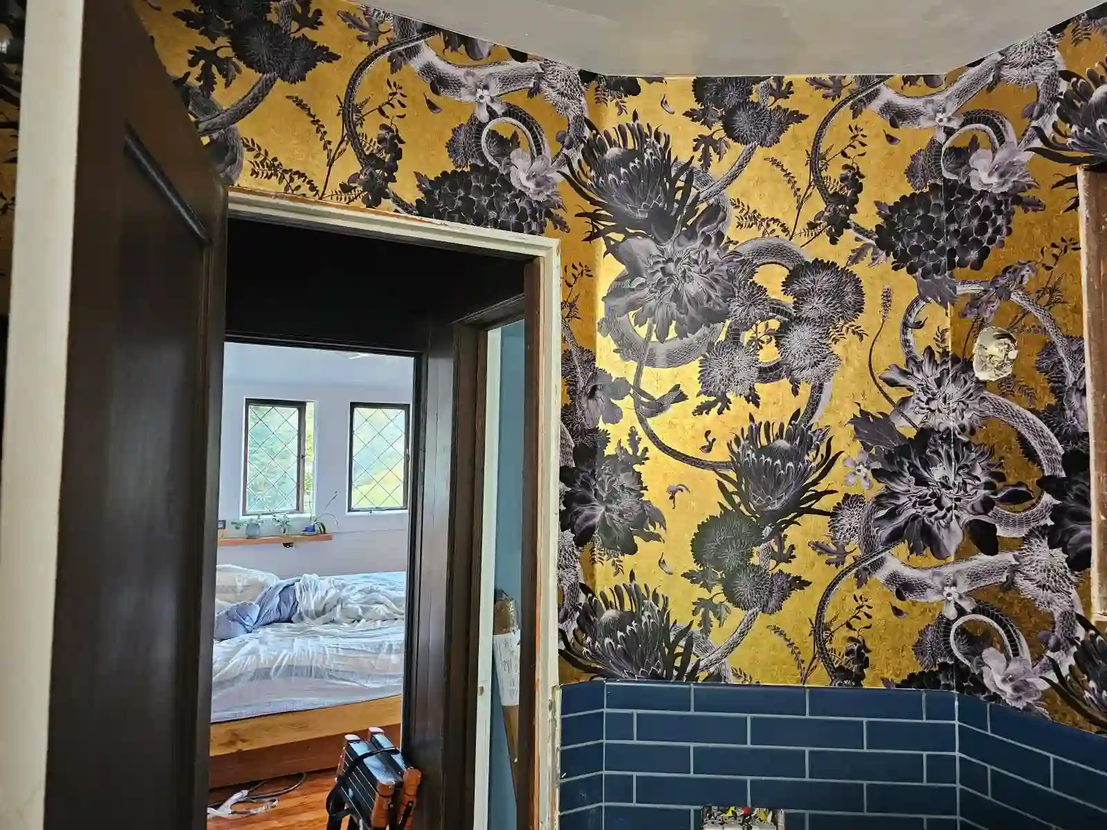 Graphic floral accent wall in a Plymouth entry near Medicine Lake