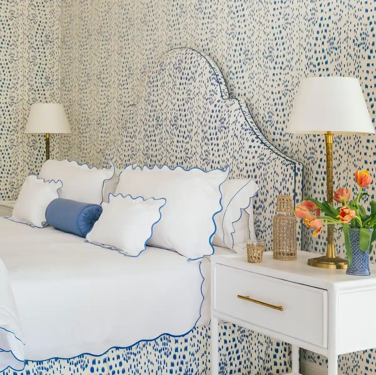 Bright bedroom wallpaper and upholstered headboard in a Blaine home near Circle Pines