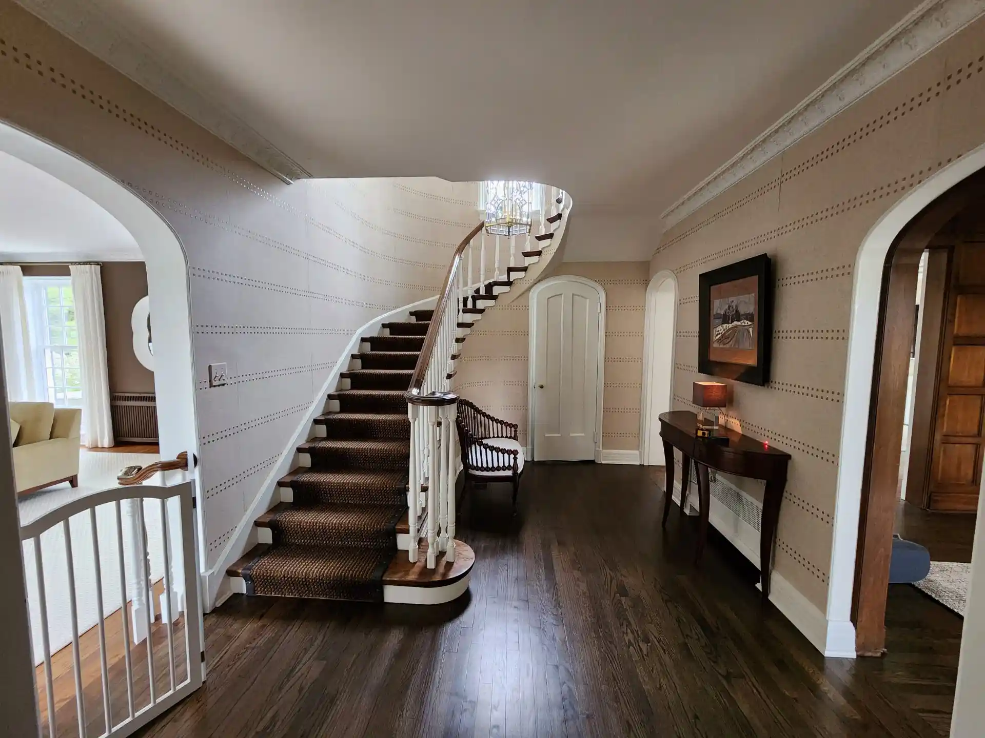 Restored stair hall wallcovering in a St Paul home near Crocus Hill
